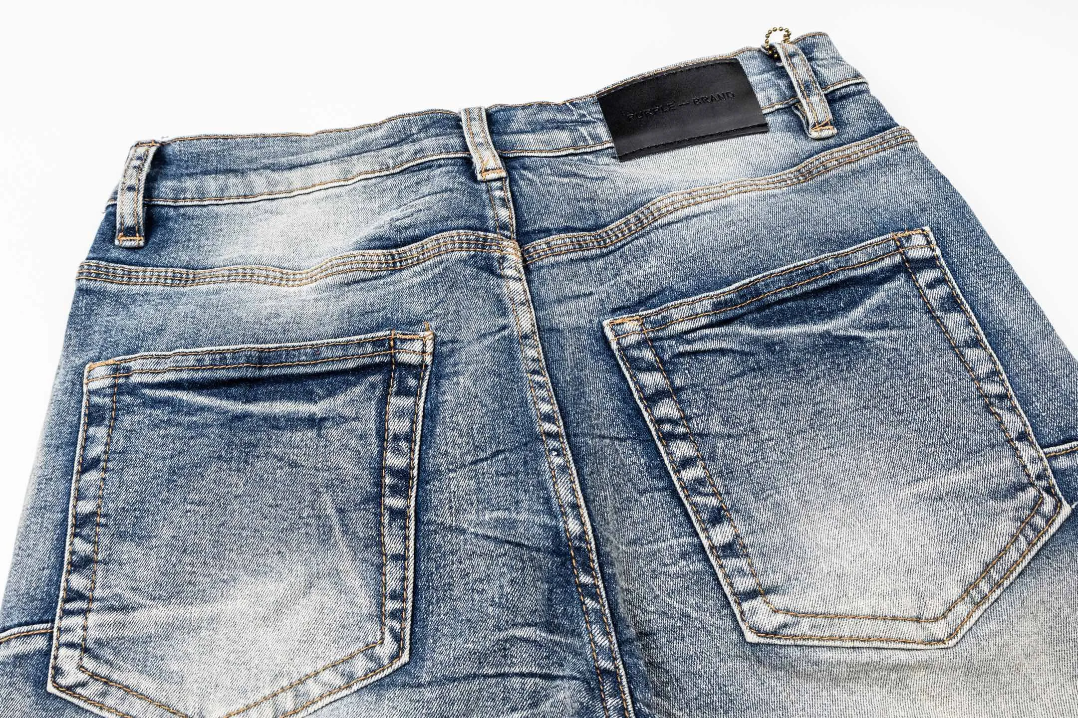 135 Purple Purple's ripped jeans are made of Light Blue washed denim fabric, giving them a full aged feel. Large holes on the thighs + brand letter patch, full of street style and flamboyant personality. Slim-fitting cut, it fits the leg lines, making it perfect for daily wear or trendy occasions. Pair it with a simple top or sneakers for a stylish look! Style number: # Size: 28 30 32 34